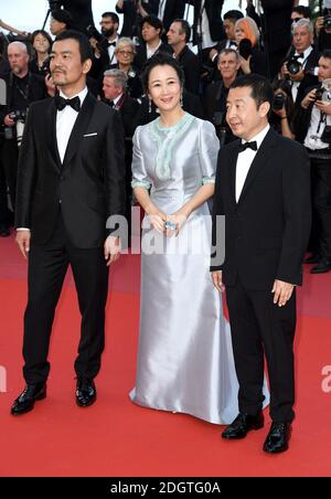 Fan Liao, Tao Zhao e Zhangke Jia che partecipano alla prima Eternals (la cenere è bianco puro) come parte del 71esimo Festival del Cinema di Cannes Foto Stock