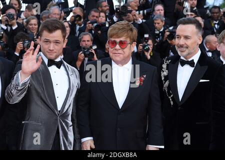 Taron Egerton, Sir Elton John e David sono presenti alla prima di Rocketman, tenuta al Grand Theatre Lumiere durante il 72esimo Festival del Cinema di Cannes. Il credito fotografico dovrebbe essere: Doug Peters/EMPICS Foto Stock