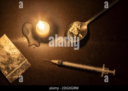 Iniezione, candela ed eroina Foto Stock