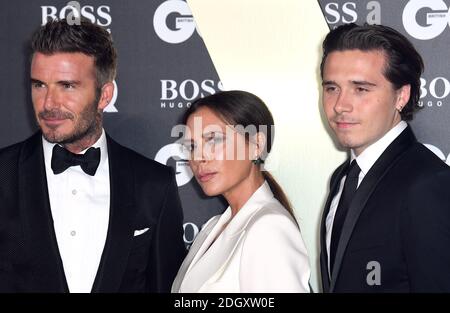 David Beckham, Victoria Beckham e Brooklyn Beckham al GQ Men of the Year Awards 2019 in collaborazione con Hugo Boss tenuto al Tate Modern di Bankside, Londra. Foto Stock