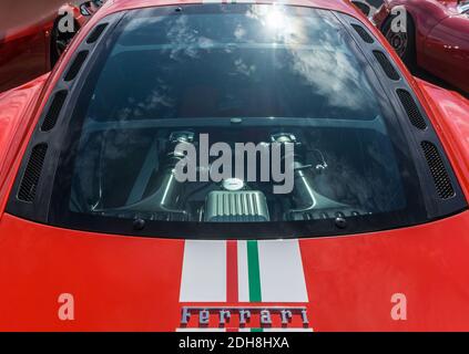 Close up detail of the rear window and engine bay on a red rosso corsa Ferrari Challenge Stradale sports coupe Stock Photo