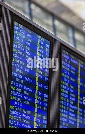 Cancelli d'imbarco segni in aeroporto di Hong Kong Foto Stock