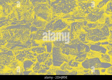 Sfondo della parete di pietra di tendenza colore di 2021. Foto Stock