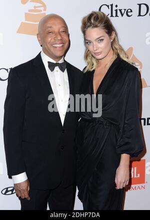 Russell Simmons e Lucy McIntosh partecipano al Pre-GRAMMY Gala 2016 e al saluto alle icone del settore in onore di Irving Azoff al Beverly Hilton Hotel di Beverly Hills, Los Angeles, CA, USA il 14 febbraio 2016. Foto di Lionel Hahn/ABACAPRESS.COM Foto Stock