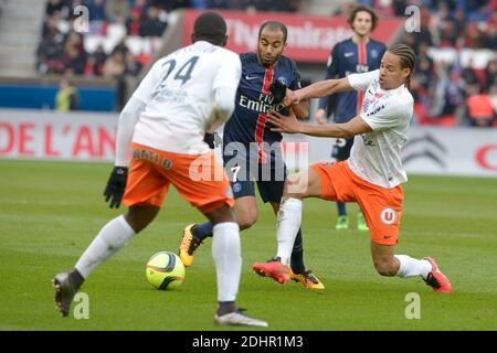 Lucas Moura di PSG ha combattuto contro Daniel Congre di Montpellier durante la prima partita di calcio della Francia, Parigi-St-Germain contro Montpellier, a Parc des Princes, Parigi, Francia, il 5 marzo 2016. PSG e Montpellier hanno disegnato 0-0. Foto di Henri Szwarc/ABACAPRESS.COM Foto Stock