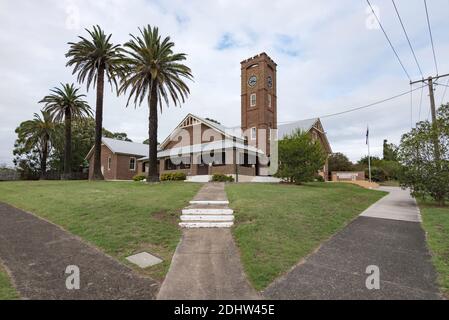 The 1924 constructed, Interwar California Bungalow style, Memorial Town Hall in Wingham, New South Wales with its and castellated corner clock tower Stock Photo