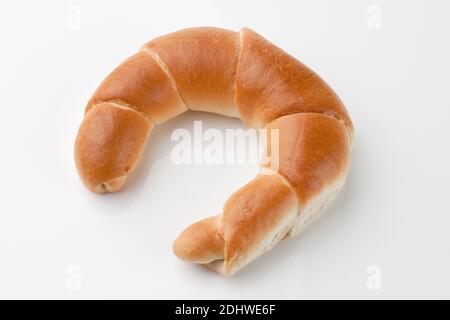Croissant e eine Tasse Kaffee zum Fruehstueck Foto Stock