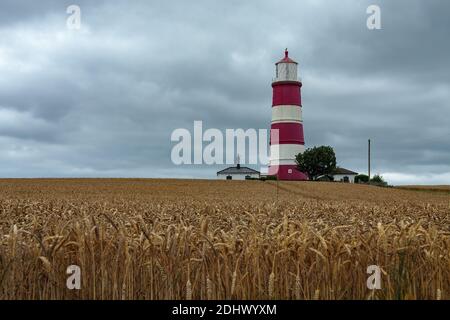 HAPPISBURGH, NORFOLK, UK - 6 AGOSTO : la tempesta si avvicina al faro di Happisburgh a Norfolk il 6 agosto 2008 Foto Stock