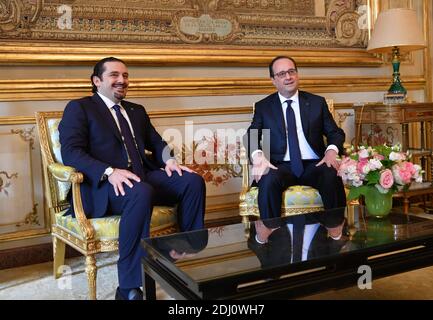 Il presidente francese Francois Hollande e l'ex primo ministro libanese Saad Hariri , leader della maggioranza parlamentare libanese, si riuniscono il 17 maggio 2016 nel palazzo presidenziale Elysee di Parigi. Foto di Christian Liegi/ABACAPRESS.COM Foto Stock