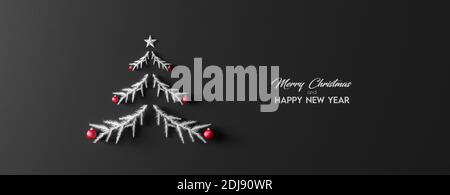 Albero di Natale fatto con rami di abete e decorazioni Red Ball Natale su sfondo nero. Vacanze invernali Greeting Card Concept rendering 3d Foto Stock