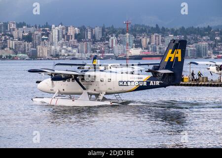 Idrovolante. Harbour Air Seaplanes è un servizio di linea di floatplane, tour e compagnia aerea charter con sede a Richmond, British Columbia. Vancouver. Canada.18. Foto Stock