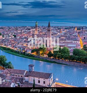 Verona, Province of Verona, Veneto, Italy. Evening view from Castel San Pietro down to the Adige river and the city of Verona Stock Photo