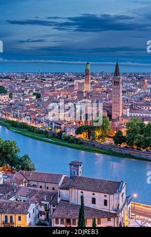 Verona, Province of Verona, Veneto, Italy. Evening view from Castel San Pietro down to the Adige river and the city of Verona Stock Photo