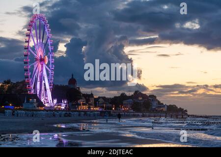 Europe, Germany, Mecklenburg-Western Pomerania, Kühlungsborn, Baltic Sea, ferris wheel, beach, evening, dusk Stock Photo