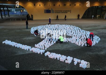 Brussels, Belgium. 14th Dec, 2020. Environmentalists work on an installation calling for the protection of forests outside the European Commission headquarters in Brussels, Belgium, on Dec. 14, 2020. Credit: Zheng Huansong/Xinhua/Alamy Live News Stock Photo