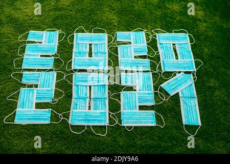 Happy New Year 2021 Year Composed Of Blue Medical Masks Foto Stock