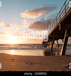 Glenelg Jetty at sunset. South Australia, Adelaide. Seaside landscape Foto Stock