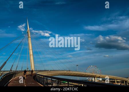 View of the Ponte del Mare, a cycle-pedestrian bridge located in Pescara (Italy). View of the access ramp of the bike path on the north side and the F Stock Photo