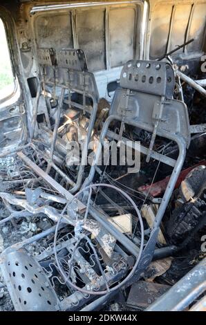 InteriorSeggiolini di auto bruciata o auto distrutta vandalized da arsonisti Foto Stock