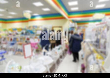 Immagine astratta offuscata e sfocata del supermercato o del centro commerciale per sfondo, sfondo o stoffa. Foto Stock