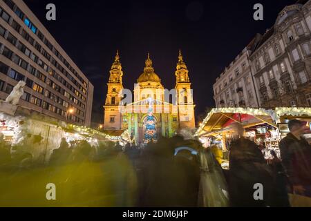 BUDAPEST, HUNGARY - DECEMBER 14: Advent market with christmas tree in front of the St. Stephens Basilica in Budapest.December 14, 2019 in Budapest, Hu Stock Photo