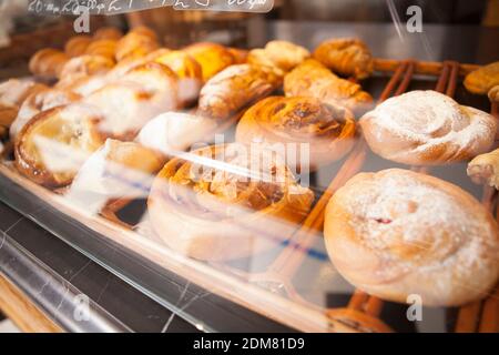 Delicious cinnabons on the display for sale at the bakery Stock Photo