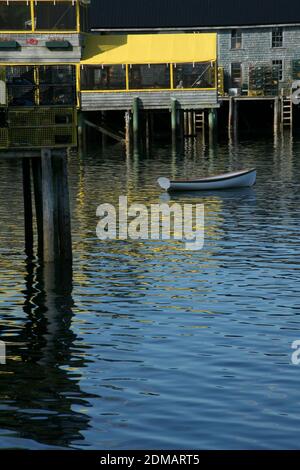 Lobster traps on wharf and lobster boats in harbor, Mount Desert Island, Acadia National Park,Bernard Maine, New England Stock Photo