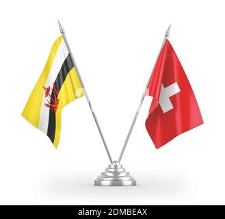 Svizzera e Brunei due bandiere da tavolo isolate su 3D bianco rendering Foto Stock
