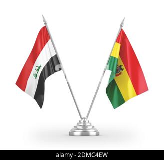 Bolivia e Iraq due bandiere da tavolo isolate su 3D bianco rendering Foto Stock