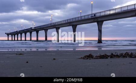 Tramonto al molo di New Brighton a Christchurch Nuova Zelanda Foto Stock