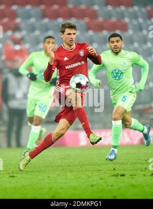 Munich, Germany. 16th Dec, 2020. Thomas MUELLER, MÜLLER, FCB 25  in the match FC BAYERN MUENCHEN - VFL WOLFSBURG 2-1 1.German Football League on December 16, 2020 in Munich, Germany.  Season 2020/2021, matchday 12, 1. Credit: Peter Schatz/Alamy Live News Stock Photo