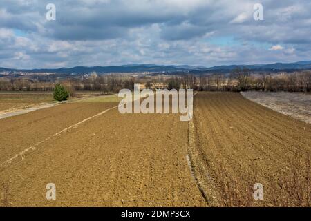 View from the hill on the beautiful gentle valley of the river Jadar and the mountains in the background. In this order, the company Rio Tinto plans t Stock Photo