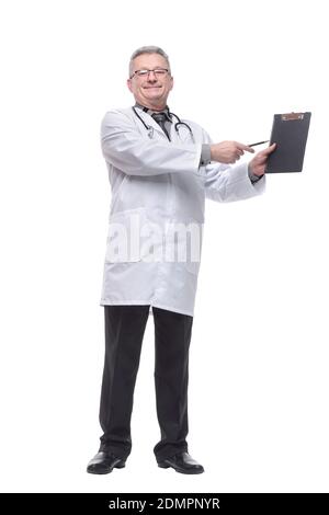 Smiling happy mature doctor showing empty clipboard to write it on your personal advice Stock Photo