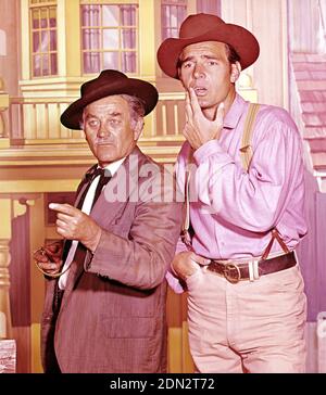 GUNSMOKE CBS TV series 1955-1975 with Dennis Weaver at right as Chester Goode and Milburn Stone as Dr. Galen Adams  about 1967 Foto Stock