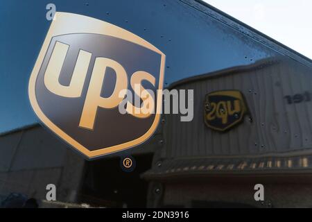 Austin, TX USA December 17, 2020: A UPS truck waits to leave as Texas Governor Greg Abbott (not shown) talks at a UPS facility about Texas' receiving its first shipments of the Pfizer anti-coronavirus vaccine on Thursday, December 17, 2020. Thousands of Texans are expected to be vaccinated over the coming days. Credit: Bob Daemmrich/Alamy Live News Stock Photo