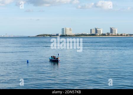 Setubal, Portugal - 17 December, 2020: fisherman checking his traps and catching octopus near Setubal on the Sado River Estuary Stock Photo