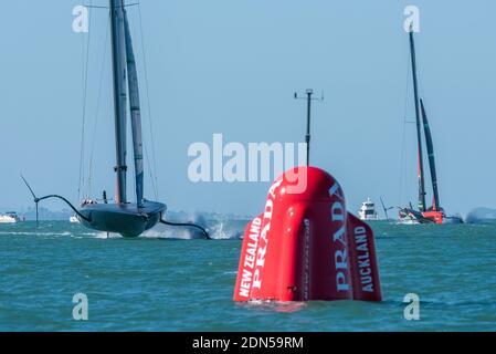 Emirates Team New Zealand chases American Magic in race four of the Regatta. PRADA America's Cup World Series Auckland Race Day One. 17/12/2020 Stock Photo