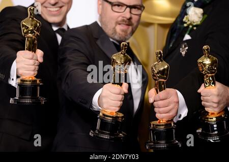 Andrew Lockley, Ian Hunter, Scott R. Fisher e Paul Franklin si pongono nella sala stampa durante l'87esimo annuale Academy Awards al Loews Hollywood Hotel il 22 febbraio 2015 a Los Angeles, California, USA. Foto di Lionel Hahn/ABACAPRESS.COM Foto Stock