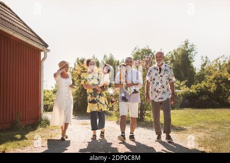 Three generation family walking together Stock Photo