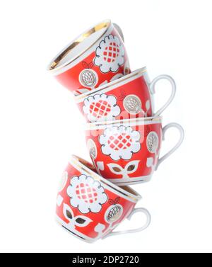 Set di tazze in ceramica retrò con motivi isolati su bianco sfondo Foto Stock