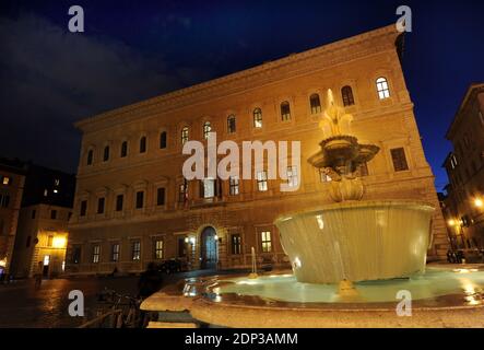 A view of Palazzo Farnese in Rome, Italy on december 12, 2014. Palazzo Farnese, which currently houses the French embassy is the most monumental of Roman Renaissance palaces, in Rome, Italy. First designed in 1517 for the Farnese family, the palace building expanded in size and conception when Alessandro Farnese became Pope Paul III in 1534. Its building history involved some of the most prominent Italian architects of the 16th century.After the extinction of the Farnese family it passed by inheritance to the king of Naples.The Palazzo was inherited from the Farnese by the Bourbon kings of Nap Stock Photo