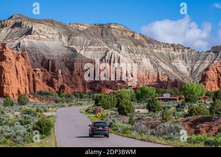 Road and cliffs by Red Dirt Wash and Dry, Kodachrome Basin State Park, Cannonville, Utah. Stock Photo