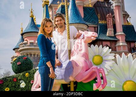 French backstroke swimmer Camille Lacourt and his wife Miss France 2008 Valerie Begue pose in front of Sleeping Beauty Castle as they enjoy a romantic visit to Disneyland Paris entertainment resort, in Marne-la-Vallee, near Paris, France on April 12, 2015. Photo by Disneyland Paris/ABACAPRESS.COM Stock Photo