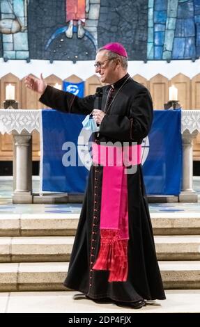 Hamburg, Germany. 13th Dec, 2020. Stefan Heße, Roman Catholic clergyman and Archbishop of Hamburg, speaks at the sending out ceremony of the Christmas Light of Peace from Bethlehem. Credit: Markus Scholz/dpa/Alamy Live News Stock Photo