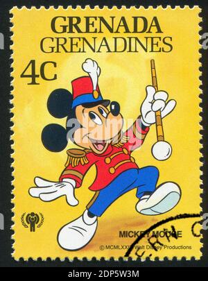GRENADA - CIRCA 1979: Francobollo stampato da Grenada, mostra i personaggi Walt Disney, tamburo maggiore Topolino, circa 1979 Foto Stock