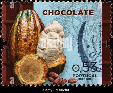 Cialda di cacao sul francobollo portoghese Foto Stock