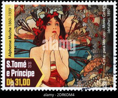 Donna dipinta da Alfons Mucha su francobollo Foto Stock