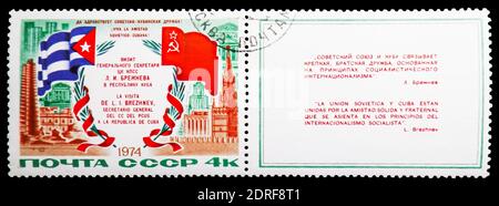 MOSCA, RUSSIA - 4 GENNAIO 2019: Un francobollo stampato in URSS (Russia) dedicato alla visita del Segretario Generale L. Brezhnev a Cuba, serie, intorno al 1974 Foto Stock