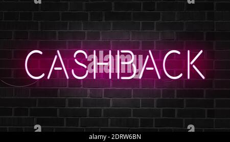 Segno rosa al neon della parola cashback sulla parete di mattoni scuri. Foto Stock