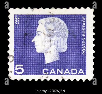 MOSCA, RUSSIA - 10 FEBBRAIO 2019: Un francobollo stampato in Canada mostra Elizabeth II, foglia di grano, 1962-64 serie definitiva, circa 1962 Foto Stock